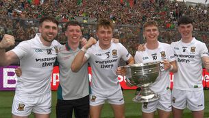 <p>Some of the Mayo team - all members of Castlebar Mitchels - celebrate with the Sam Maguire Cup in Croke Park last Sunday, from left: Paddy Durcan, Sean Morahan, Donnacha McHugh, John MacMonagle and Bob Tuohy.	 Picture: David Farrell Photography </p>