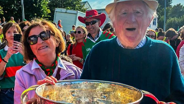 Louise and Mike Keane with the Sam Maguire Cup at the Claremorris Homecoming for the Mayo team.