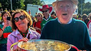 <p>Louise and Mike Keane with the Sam Maguire Cup at the Claremorris Homecoming for the Mayo team.</p>