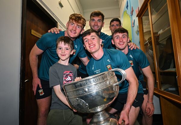 Mayo players, from left, Jack Carney, Jack Coyne, Aidan O'Shea and Eoin McGreal with supporter Nathaniel Leonard, aged 8, Loughshinny, Dublin at CHI Temple Street in Dublin after being crowned All-Ireland Senior Football champions. Picture: Sam Barnes/Sportsfile