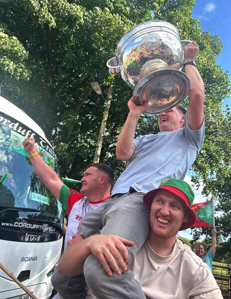 Mayo’s James Carr being hoisted high with the Sam Maguire Cup by his brothers Martin and Joe on his arrival to his home club in Ardagh for homecoming celebrations last week. Picture courtesy Ardagh GAA. Mayo’s James Carr being hoisted high with the Sam Maguire Cup by his brothers Martin and Joe on his arrival to his home club in Ardagh for homecoming celebrations last week. Picture courtesy Ardagh GAA.