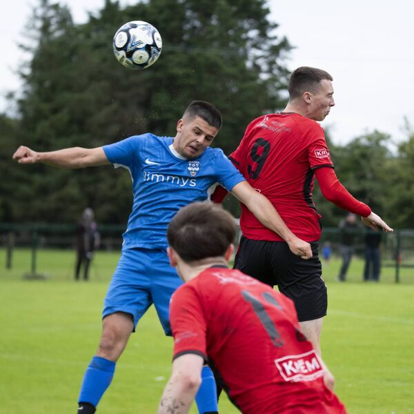 Ballina Town's Martin Delaney with Dan O'Malley (9) and Alex Halpin of Westport United. Picture: John Corless Ballina Town's Martin Delaney with Dan O'Malley (9) and Alex Halpin of Westport United. Picture: John Corless