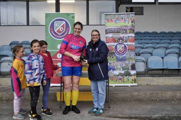 Mairead Corrigan of Achill Rovers receives the player of the match award from Diana Hopkins treasurer Mayo Women's League. Picture: Dee Ryan