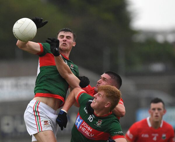 Frank Irwin and Luke Feeney of Ballina Stephenites are challenged for possession by Garrymore’s Gary Golden during last Saturday's Connacht Gold Mayo SFC clash at James Stephens Park. Picture: David Farrell Photography Frank Irwin and Luke Feeney of Ballina Stephenites are challenged for possession by Garrymore’s Gary Golden during last Saturday's Connacht Gold Mayo SFC clash at James Stephens Park. Picture: David Farrell Photography