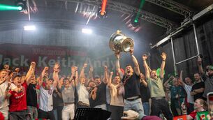 <p>Mayo captain Jack Coyne raises the Sam Maguire Cup at the homecoming in his native Ballyhaunis. Picture: Adam Kaczmarek</p> <p>Mayo captain Jack Coyne raises the Sam Maguire Cup at the homecoming in his native Ballyhaunis. Picture: Adam Kaczmarek</p>