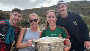 <p>Mayo stars Enda Hession and Jack Coyne pictured with fans Ciara Molony (left) and Laura Mannion and Sam Maguire climbing Croagh Patrick today. </p> <p>Mayo stars Enda Hession and Jack Coyne pictured with fans Ciara Molony (left) and Laura Mannion and Sam Maguire climbing Croagh Patrick today. </p>