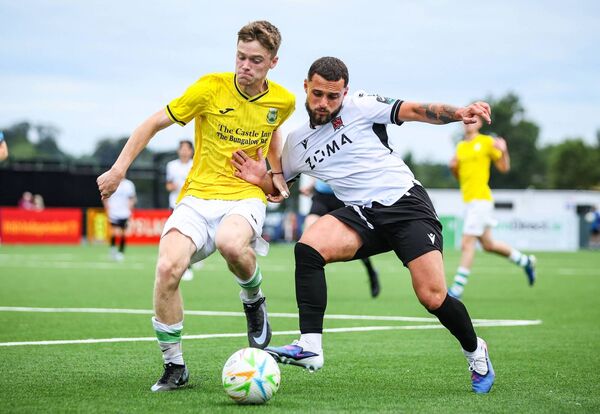 Dundalk FC's Leo Gaxha and Mark Cunningham of Castlebar Celtic in a duel for possession during the Club Orange FAI Cup third round tie in Oriel Park. Picture: INPHO/Dan Clohessy