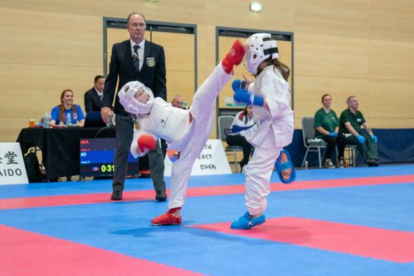 Doireann Lumsden, seen performing an impressive leg kick, took home a gold medal in kumite. Credit: Mayo Karate Academy. 