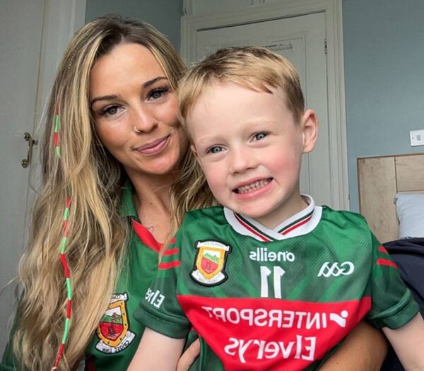 Edwina and her five-year-old son Noah wearing their Mayo jerseys celebrating the historic win. Edwina and her five-year-old son Noah wearing their Mayo jerseys celebrating the historic win.