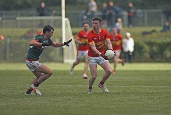 Castlebar Mitchels' Sean Morahan looks to get past Ballina Stephenites' Sam Callinan during the Connacht Gold Mayo SFC Round 2 game on Friday night in Castlebar. Picture: Conor McKeown
