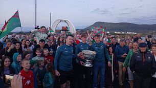 <p>All-Ireland champions Diarmuid O'Connor, Jack Carney and Donnacha McHugh pictured after carrying Sam Maguire onto Achill Island on Sunday evening. Carney played the drums on the way across.</p> <p>All-Ireland champions Diarmuid O'Connor, Jack Carney and Donnacha McHugh pictured after carrying Sam Maguire onto Achill Island on Sunday evening. Carney played the drums on the way across.</p>