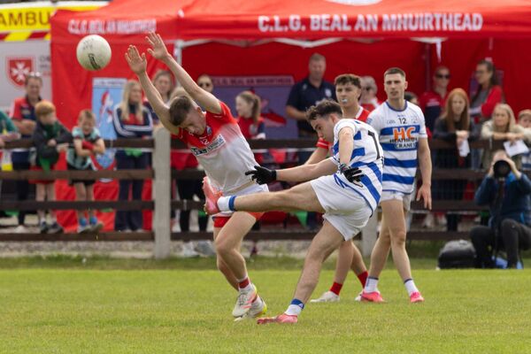 Belmullet's James O’Donnell is unable block Breaffy's Pierce Deane from getting his shot away. Picture: Ryan Gallagher Photography