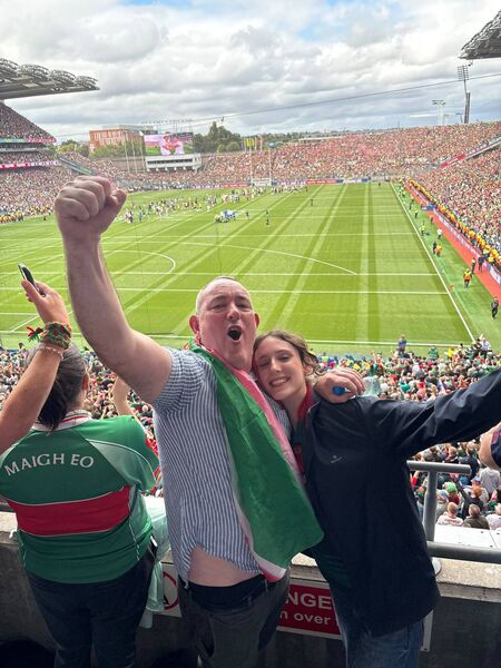 Kieran and Lily-Rose O'Brien after the final whistle before he took ill.