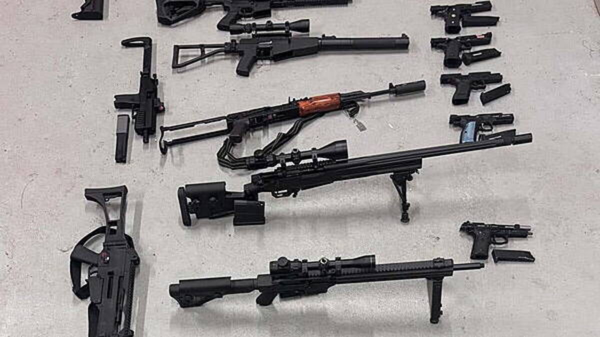 Two men arrested after 22 fake firearms and cannabis seized