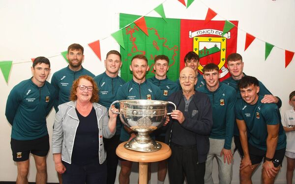  Jimmy Browne, captain of the Mayo team that reached the 1989 All-Ireland SFC Final, with his wife Patricia and members of the victorious Mayo team at Ballina Medical Centre. Picture: John O'Grady