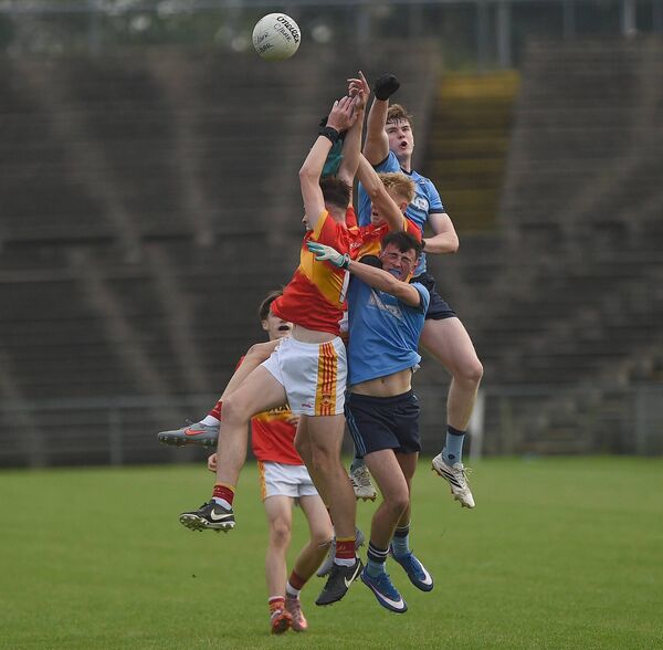 Westport and Castlebar Mitchels players compete for possession at midfield. Pictures: Conor McKeown