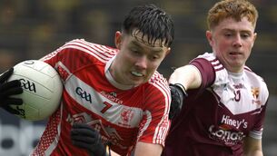 <p>Moy Davitts’ Brady Guilfoyle is closely marked by Crossmolina’s Conor Howley.	Picture: David Farrell Photography</p>