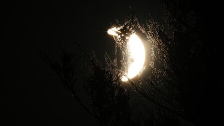 Racing against the partial solar eclipse over Knock Ma 