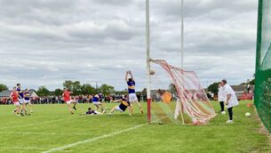 <p>Stephen O’Malley (centre) fires the ball to the net to help give Ballintubber the edge over Mayo Gaels during their Mayo SFC Group 3 encounter in Round 2.	Picture: Tom Quinn</p>