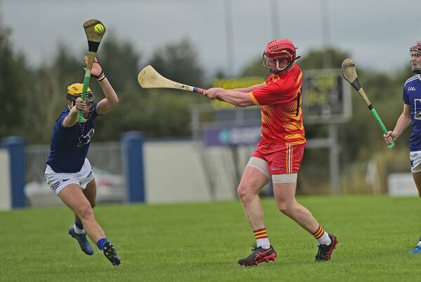 Barry Lane of Castlebar Mitchels has his shot blocked by Tooreen's David Kenny during last Sunday's Mayo SHC semi-final at Adrian Freeman Memorial Park.	Picture: Conor McKeown