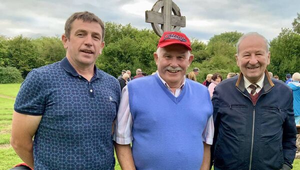 Patrick Lally, Ollie Dillon and Michael Corbett pictured at the recent Mass on Church Island. Picture by Tom Quinn.