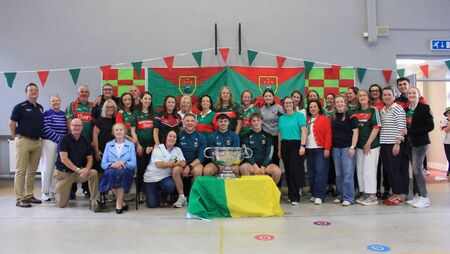 Local Notes: Past and Present staff of Breaffy NS with the Sam Maguire