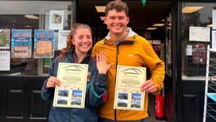 <p>Grace Queenan & Tom Hook collecting their Nephin Summit Certificate from Barrett's of Lahardane. Their climb was made all the more special by the couple having got engaged atop the mountain. Pic: barrettsoflahardane instagram</p> <p>Grace Queenan & Tom Hook collecting their Nephin Summit Certificate from Barrett's of Lahardane. Their climb was made all the more special by the couple having got engaged atop the mountain. Pic: barrettsoflahardane instagram</p>