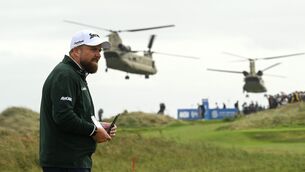 <p>Shane Lowry is pictured during day three of the Amgen Irish Open Golf Championship 2026 at Trump International Golf Links in Doonbeg as President Trump's Marine One helicopter arrives. Picture: Ramsey Cardy/Sportsfile</p> <p>Shane Lowry is pictured during day three of the Amgen Irish Open Golf Championship 2026 at Trump International Golf Links in Doonbeg as President Trump's Marine One helicopter arrives. Picture: Ramsey Cardy/Sportsfile</p>
