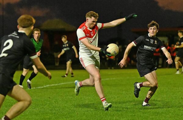 Garrymore midfielder Aaron Hughes winds up to take a shot in Saturday night's Mayo SFC quarter-final, as Niall Coggins of Crossmolina Deel Rovers closes in. Picture: Conor McKeown Garrymore midfielder Aaron Hughes winds up to take a shot in Saturday night's Mayo SFC quarter-final, as Niall Coggins of Crossmolina Deel Rovers closes in. Picture: Conor McKeown