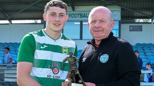 <p>Player of the match, Castlebar Celtic's Paddy Hope, receives his trophy from Mayo League secretary, John Durkan. Picture: John Corless</p>