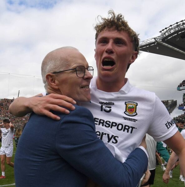 Mayo GAA County Board Chairman, Seamus Tuohy, celebrates with Kobe McDonald. Picture: David Farrell Photography Mayo GAA County Board Chairman, Seamus Tuohy, celebrates with Kobe McDonald. Picture: David Farrell Photography