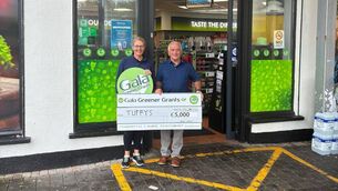 <p>Sinead and Brian Tuffy outside their store on the Foxford Road in Ballina. </p>
