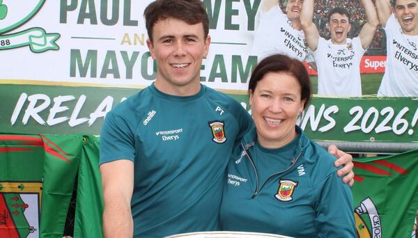 Paul Towey and Valerie Murphy (County Board Treasurer) pictured with Sam Maguire on their home turf of Fr O'Hara Park, Charlestown. Paul Towey and Valerie Murphy (County Board Treasurer) pictured with Sam Maguire on their home turf of Fr O'Hara Park, Charlestown.