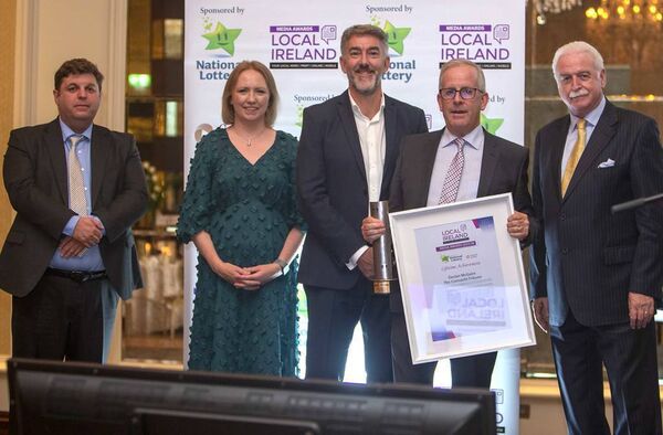 Ballina native Declan McGuire receives his Lifetime Achievement Award. Also included, from left: CEO of the National Lottery Cian Murphy; Director of Media Development for Coimisiún na Mean Sinéad Crowley; President of Local Ireland Sean Mahon and MC Marty Whelan. 