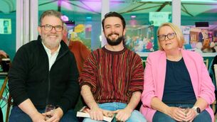 <p>John Armstrong (centre) pictured with his parents Ken and Patricia at last year's Wild Atlantic Words Festival. Photo: John Mee.</p>