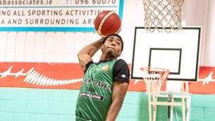 <p>Joseph Owens flying high for Team Bar Square Ballina to slam dunk on his debut in last Saturday night's cup win against Dublin Raiders.	Picture: Wildatlanticimages</p>