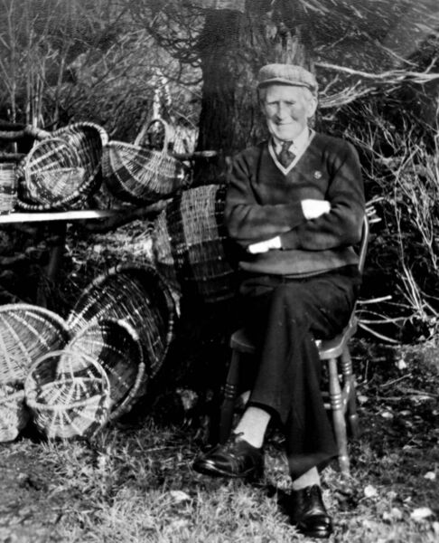 The late Harry McCarrick pictured in the 1990s with a collection of his baskets. 	Picture: Pat McCarrick