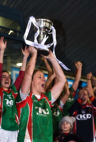 Carnacon captain Cora Staunton lifts the trophy following her side's victory during the All-Ireland Ladies Football Senior Club Senior Championship Final match between Carnacon and Mourneabbey at Parnell Park in Dublin. Photo by Seb Daly/Sportsfile Carnacon captain Cora Staunton lifts the trophy following her side's victory during the All-Ireland Ladies Football Senior Club Senior Championship Final match between Carnacon and Mourneabbey at Parnell Park in Dublin. Photo by Seb Daly/Sportsfile