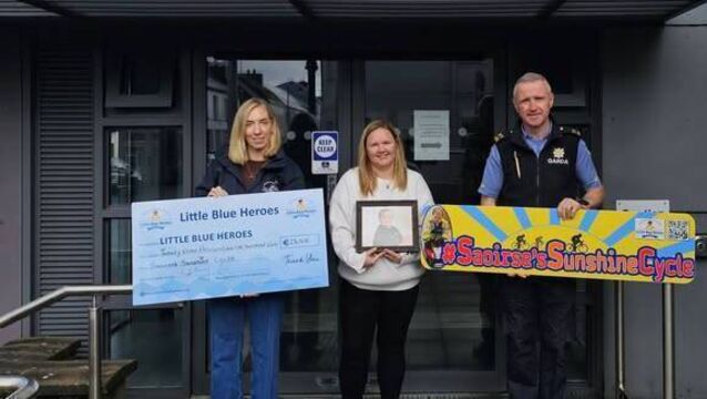 <p>From left, Garda Audrey Garvey, the Little Blue Heroes representative for Mayo, Saoirse’s mother, Martina Duggan, and Community Garda John Monaghan.</p>