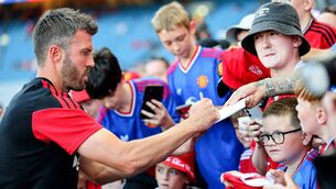 <p>Michael Carrick signs autographs for fans at his side's pre-season friendly against Leeds United at Croke Park last August, when the world seemed full of possibilities for the Manchester United manager.	Picture: INPHO/Ryan Byrne</p>
