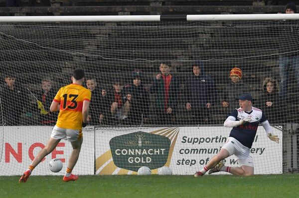 Cian Walsh (above) sends Garrymore goalkeeper Brian Lynskey the wrong way from the penalty spot and (right) celebrates his goal that helped Castlebar Mitchels to an eight points win. Picture: David Farrell Photography Cian Walsh (above) sends Garrymore goalkeeper Brian Lynskey the wrong way from the penalty spot and (right) celebrates his goal that helped Castlebar Mitchels to an eight points win. Picture: David Farrell Photography