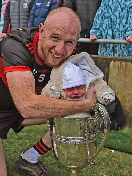 Has there ever been a younger spectator at a county final than 5-day-old Rosie Waldron who is pictured with her dad Tom who featured at wing-back for Davitts in their Mayo IFC Final win against Ballinrobe on Sunday. Picture: Conor McKeown Has there ever been a younger spectator at a county final than 5-day-old Rosie Waldron who is pictured with her dad Tom who featured at wing-back for Davitts in their Mayo IFC Final win against Ballinrobe on Sunday. Picture: Conor McKeown